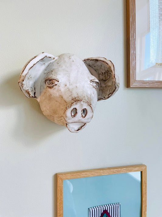 Håndlavet griseskulptur til væggen