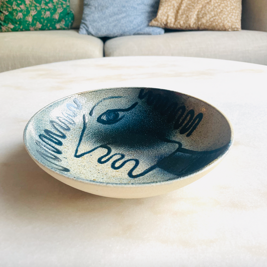Handmade bowl with a face