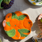 Dish with oranges